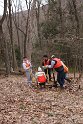 Mercyhurst students locating and marking an abandoned well.