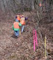 The crew leaving a marked well site.